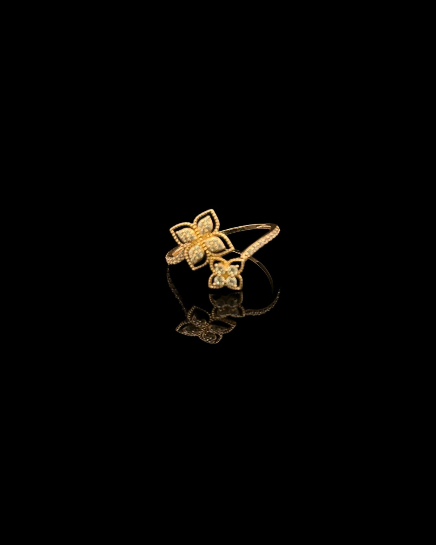 14K GOLD CZ FLOWER RING (1.1GR 6.5")