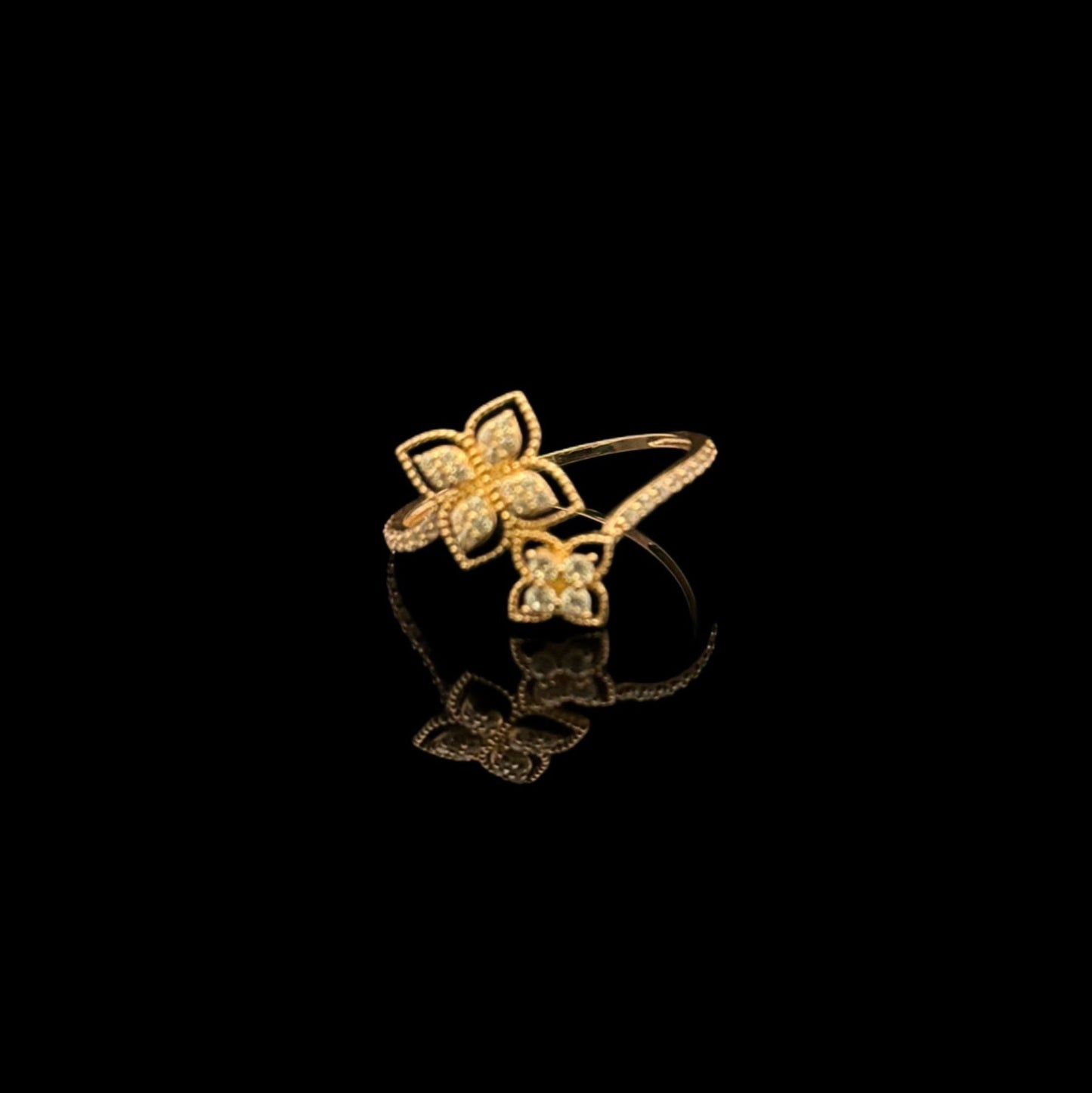 14K GOLD CZ FLOWER RING (1.1GR 6.5")