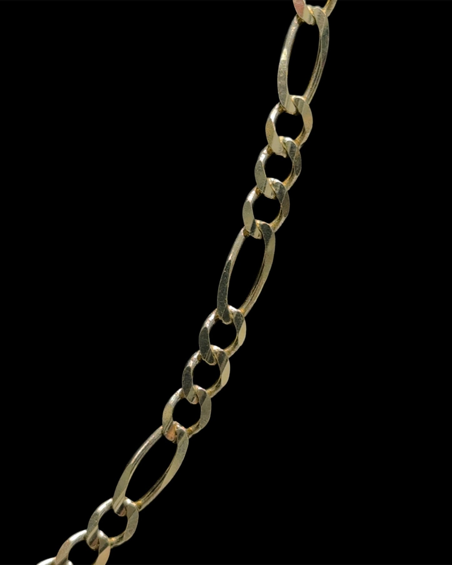 CADENA FIGARO HOLLOW 12.1GR 6.4MM 14K 22"
